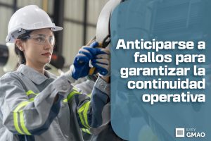 Operario industrial supervisando maquinaria con sistema de mantenimiento predictivo digital