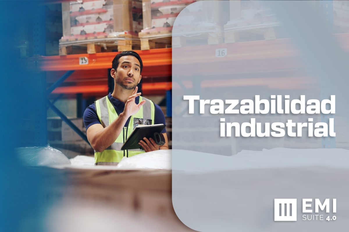 Operario de almacén gestionando trazabilidad industrial con tablet en planta de producción, EMI Suite 4.0